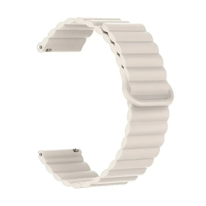A white adjustable magnetic loop watch band shown in a curved shape.