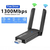محول بطاقة شبكة لاسلكي أسود مع هوائي، مُعلن عنه كجهاز واي فاي 1300Mbps بدون تعريف.