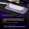A close-up view of a purple and white hot-swap mechanical gaming keyboard with RGB backlight and various keycaps.