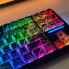 Close-up view of a translucent cherry mechanical keyboard with RGB lighting displaying various colors.
