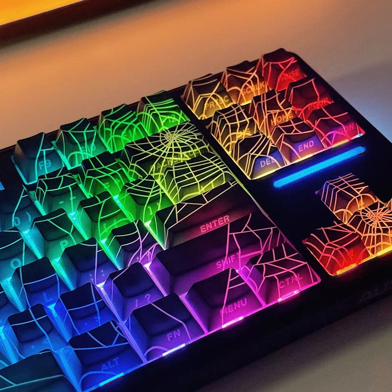 Close-up view of a translucent cherry mechanical keyboard with RGB lighting displaying various colors.