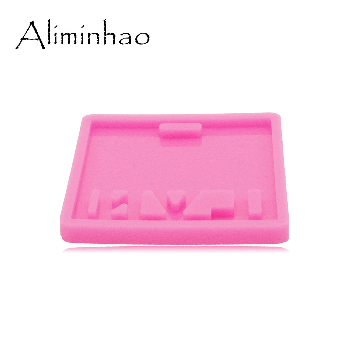 A pink silicone resin mold with various shapes for crafting and DIY projects.