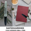 A green marker pen is shown next to a red notebook, illustrating safeguarding small items.