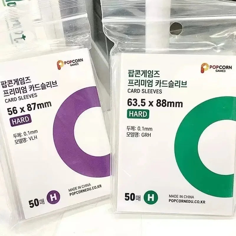 Packaged card sleeves for popcorn games showing various sizes and quantities