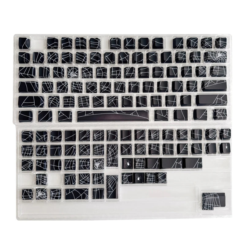 A translucent cherry mechanical keyboard featuring black keycaps and white legends.