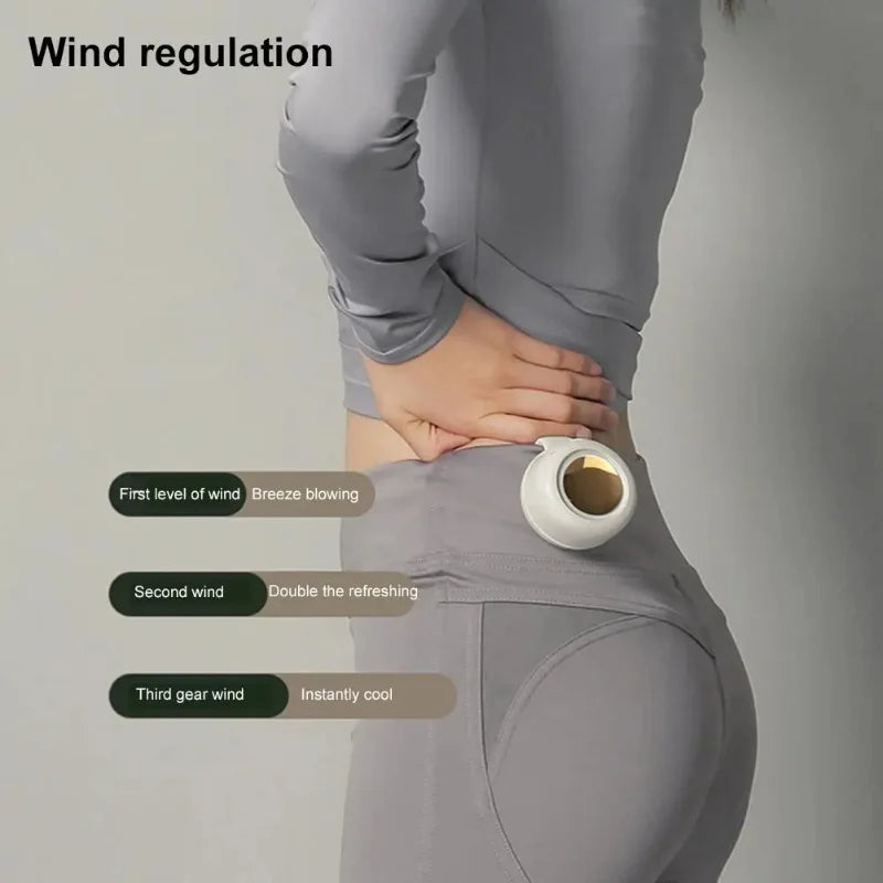 A person is demonstrating wind regulation on a gray garment, showing three levels of wind effect.