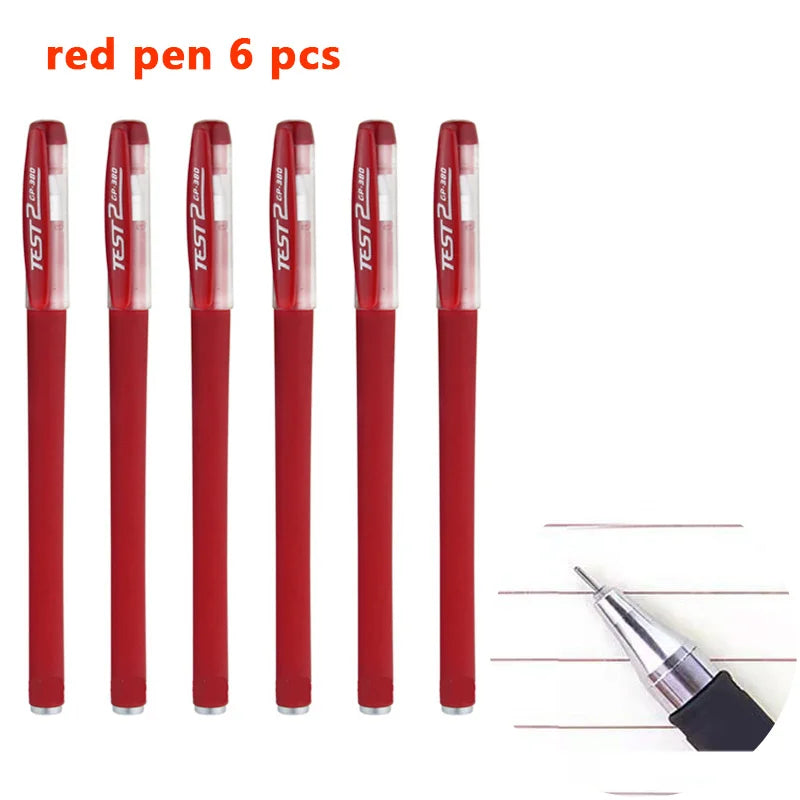 Seis bolígrafos de gel rojos Test 2-3P en pie, en fila.