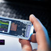 A hand holds a laptop and displays a portable device showing Read Only Mode features for data security.