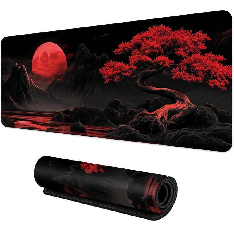 A black mouse pad featuring a dramatic red and black landscape with a large red moon and silhouetted trees.