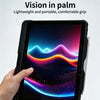 A hand holds a black tablet case with an illuminated screen displaying a colorful landscape.