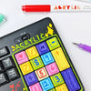 A close-up of a black keyboard featuring colorful acrylic marker pens and a yellow pencil, demonstrating stylish typing and a
