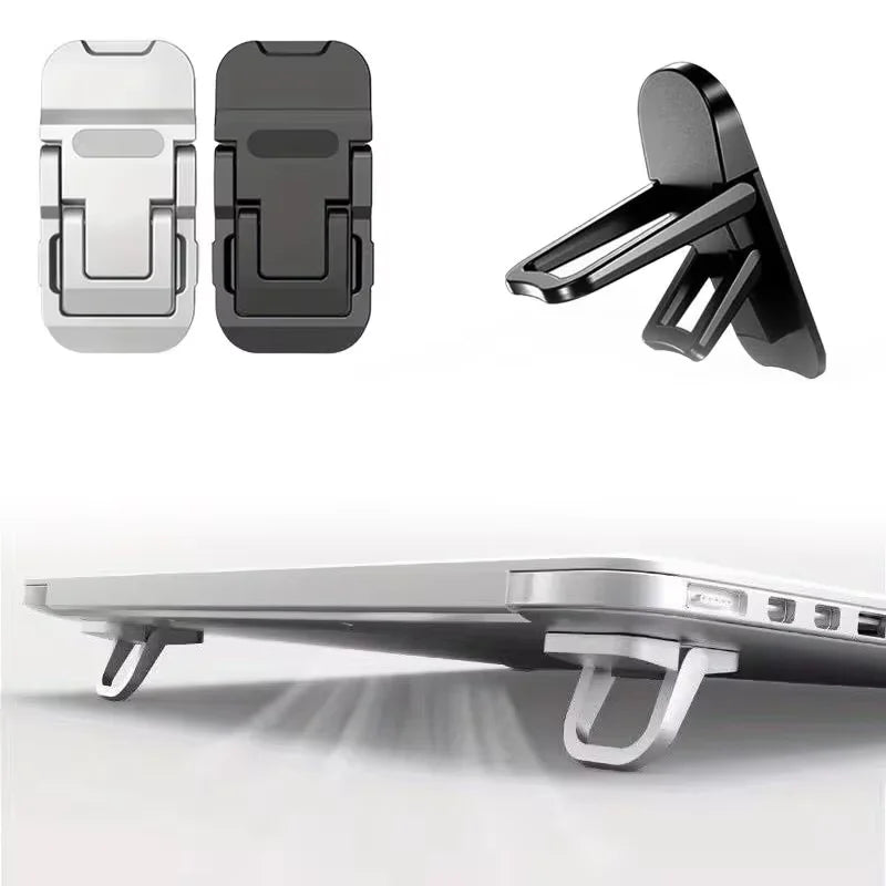 A set of two foldable laptop and tablet stands, shown in silver and black, with one stand being used to elevate a laptop.