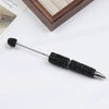 A black beaded pen accessory with a silver tip is shown on a white background.