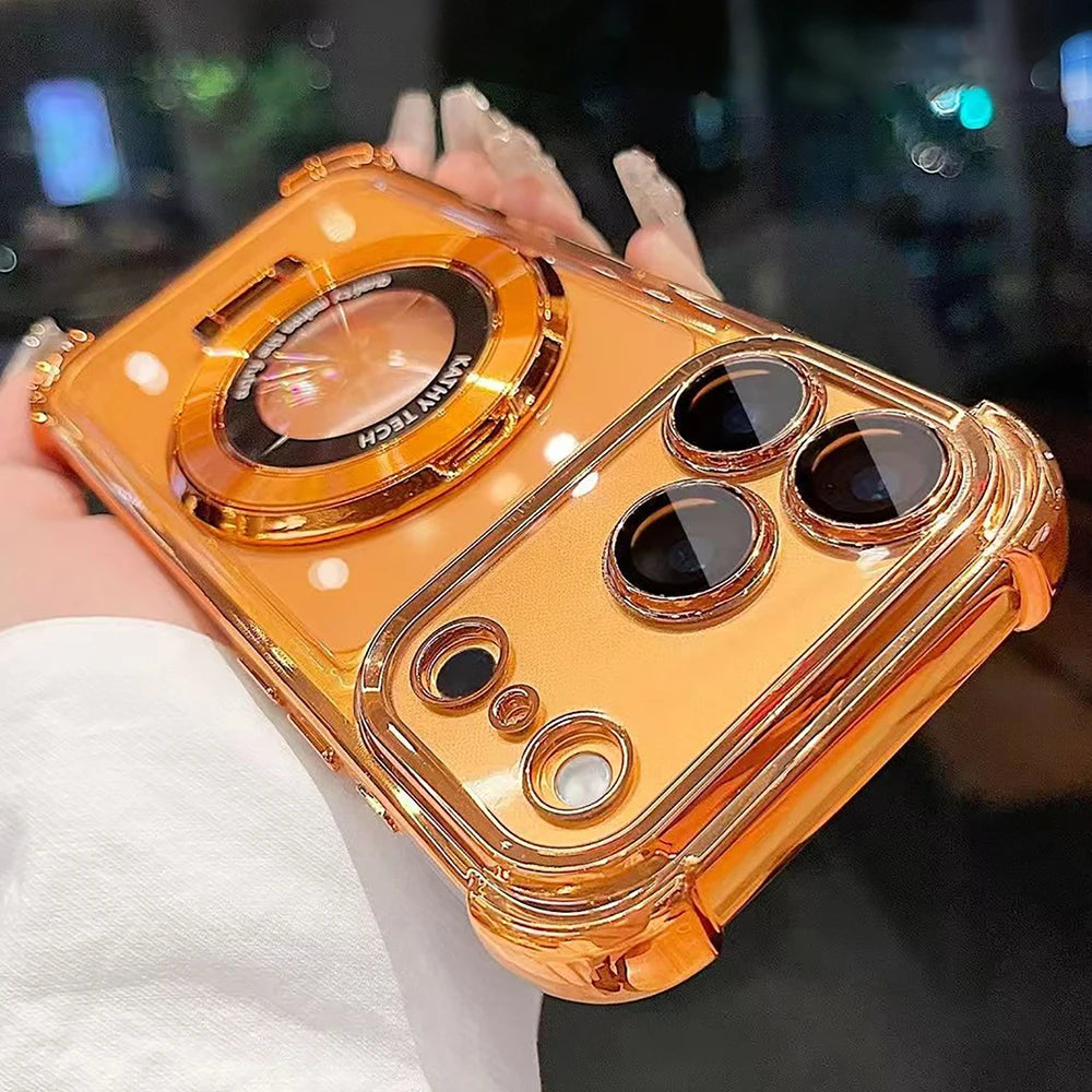 A close-up of an orange iPhone magnetic stand case with a kickstand and lens protection being held by a person.