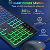 Nahaufnahme einer kabellosen RGB-Tastatur- und Maus-Kombination mit grünem Hintergrundbeleuchtung und schwarzer Oberfläche.