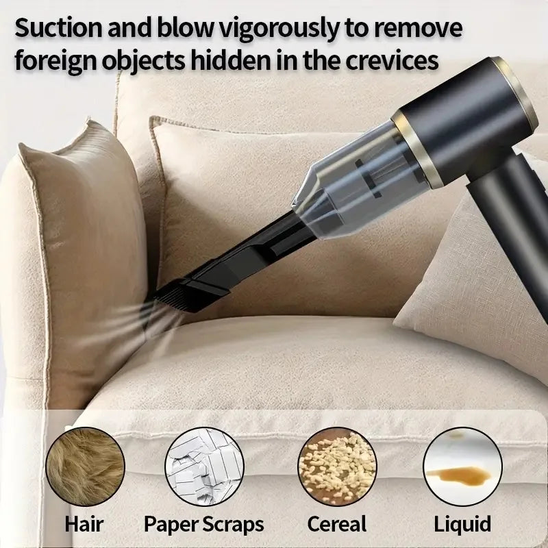 A black portable vacuum cleaner is shown suctioning foreign objects from the crevices of a beige cushion.