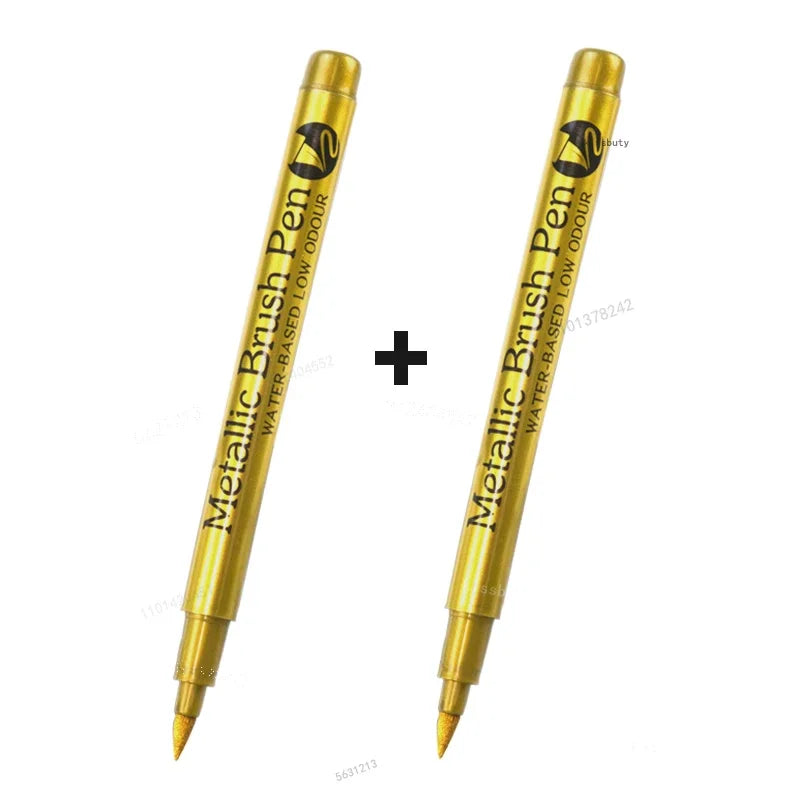 Two metallic brush pen markers shown vertically, one gold and one silver, for art and craft projects.