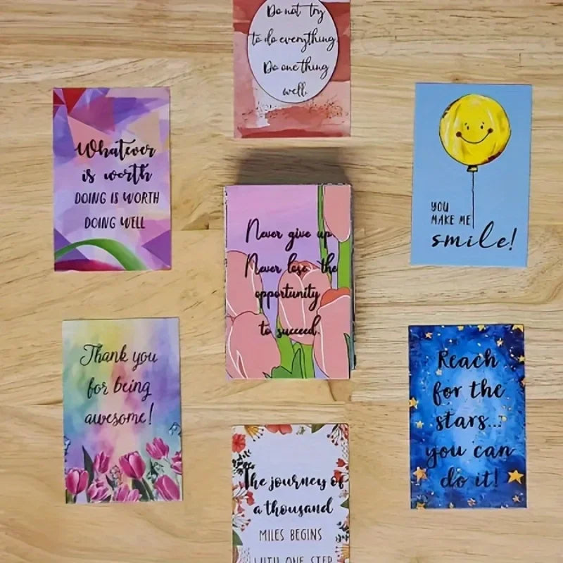 A collection of nine colorful motivational greeting cards featuring positive messages and illustrations.