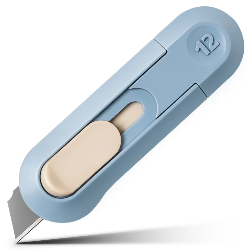 A light blue portable mini paper cutter with a beige blade and a number 12 marking.