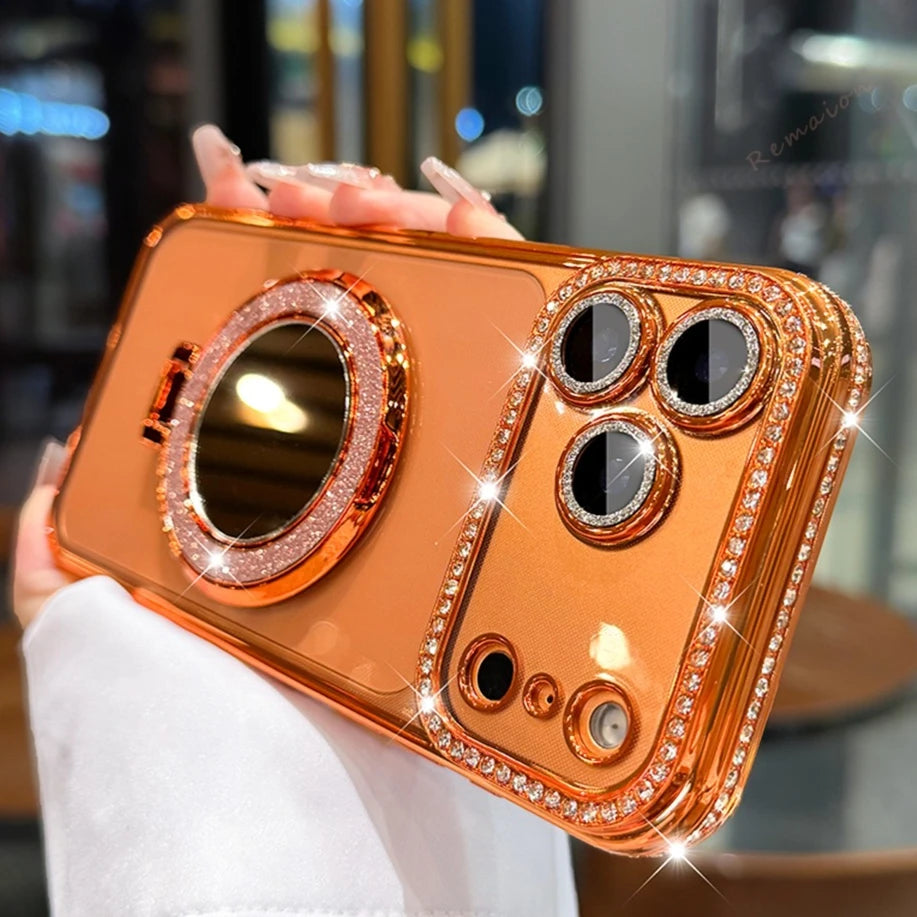 Eine Hand hält eine glitzernde diamantförmige magnetische Hülle in Roségoldfarbe für ein iPhone.