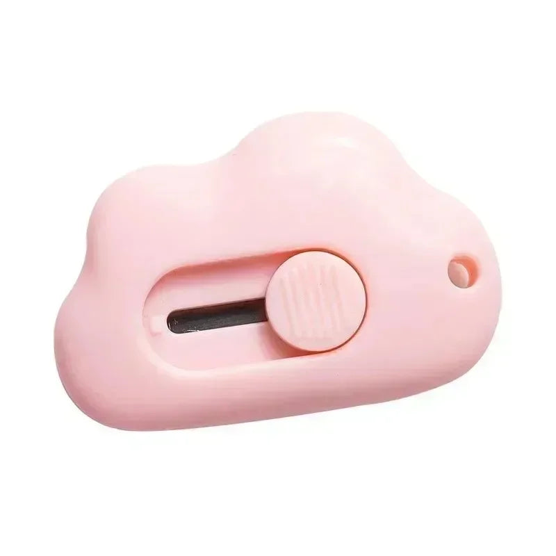 A pink portable rabbit cloud letter opener and crafting tool with a round opening mechanism.
