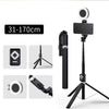 A black extendable phone tripod featuring an LED ring light and mirror, shown with various dimensions.