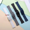 Five replacement silicone watch straps in white, gray, black, and blue are displayed on a light background.