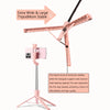 Trépied extensible rose pour smartphone, montrant ses fonctionnalités de stabilité et sa construction.
