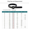 A black ring size and measurement tool with a scale for measuring finger rings.