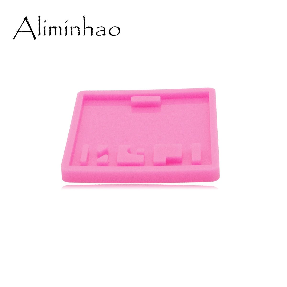 A pink silicone resin mold with various indentations for crafting and DIY projects.