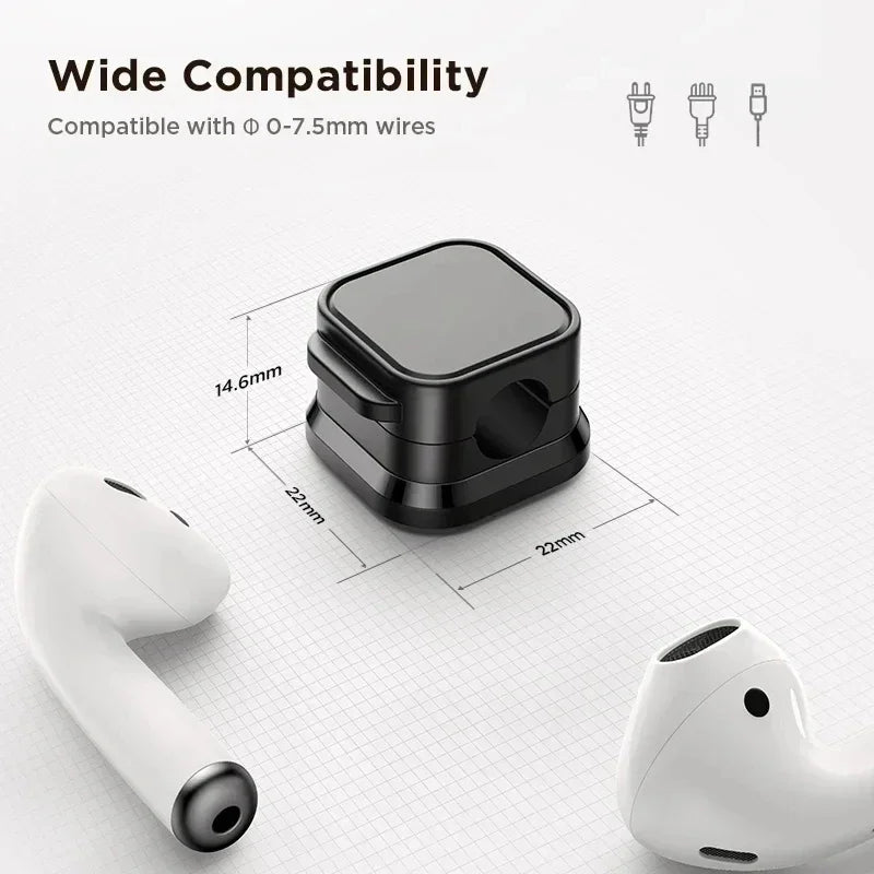 A pair of white magnetic cable clips shown next to a black clip and a wire, demonstrating wide compatibility for desk organiz