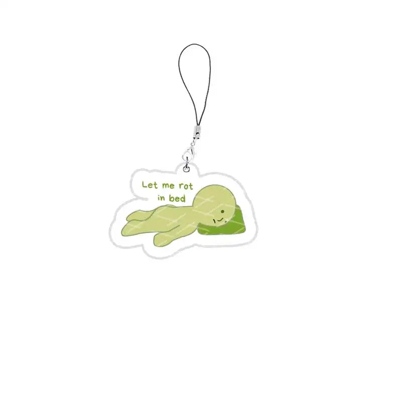 A green, slime-like character charm attached to a silver keychain.