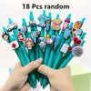 A hand holds a bundle of 18 random medical theme ballpoint pens featuring various nurse and medical icons.