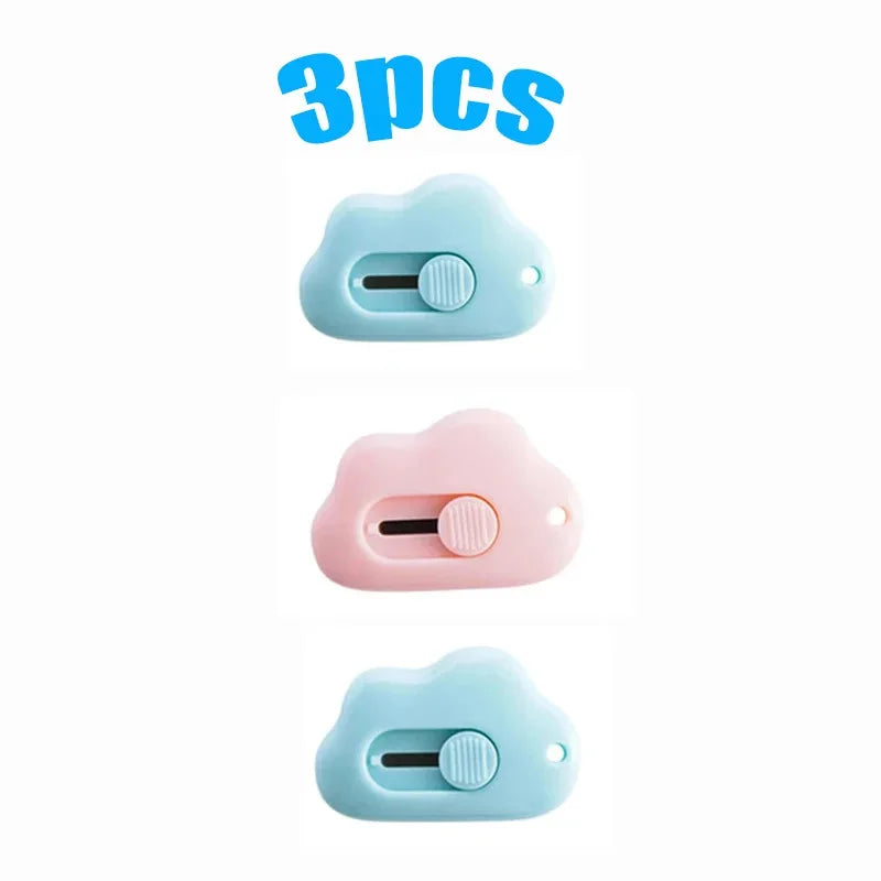 A set of three multi-color rabbit cloud utility knives in light blue, pink, and light blue.