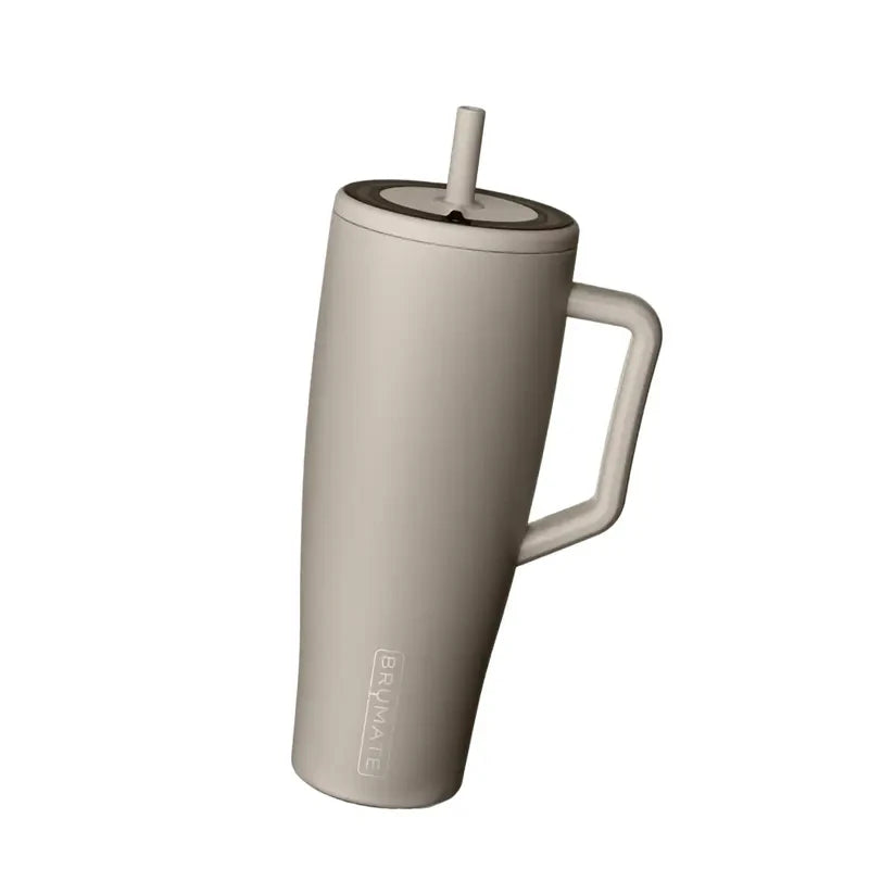 A beige Brümate Era 40 oz insulated tumbler with a lid, handle, and straw.