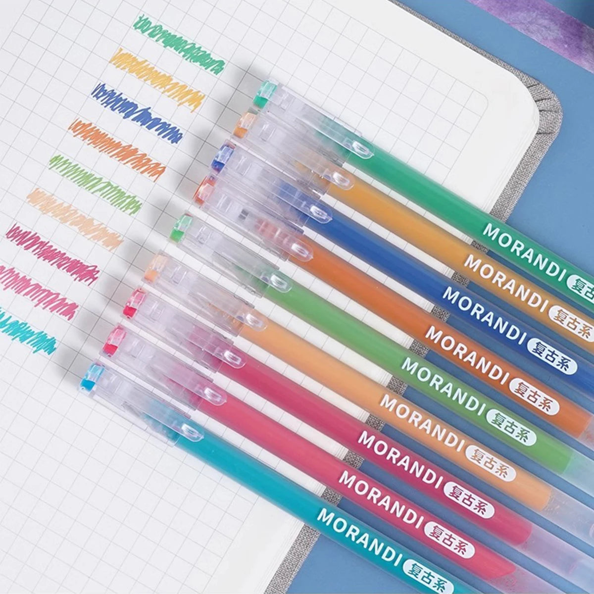 A collection of Morandi gel pens in various colors arranged on a lined notebook paper.
