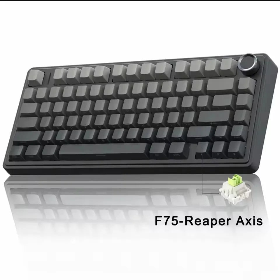 A black mechanical keyboard, the F75-Reaper Axis, is shown with a small green accessory.