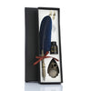 A black box contains a set of retro calligraphy feather dip pens, including a feather, a pen, and a decorative metal piece.