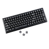 A close-up view of black carbon fiber texture keycaps for MX Mechanical keyboards.