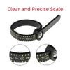 A black ring sizer and measuring tool with a magnifier showing various sizes.