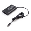 Black 130W USB-C laptop charger with a coiled black cable.