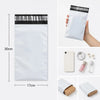 A white self-adhesive courier mailer bag with a black header, shown next to its dimensions and a cosmetic product.