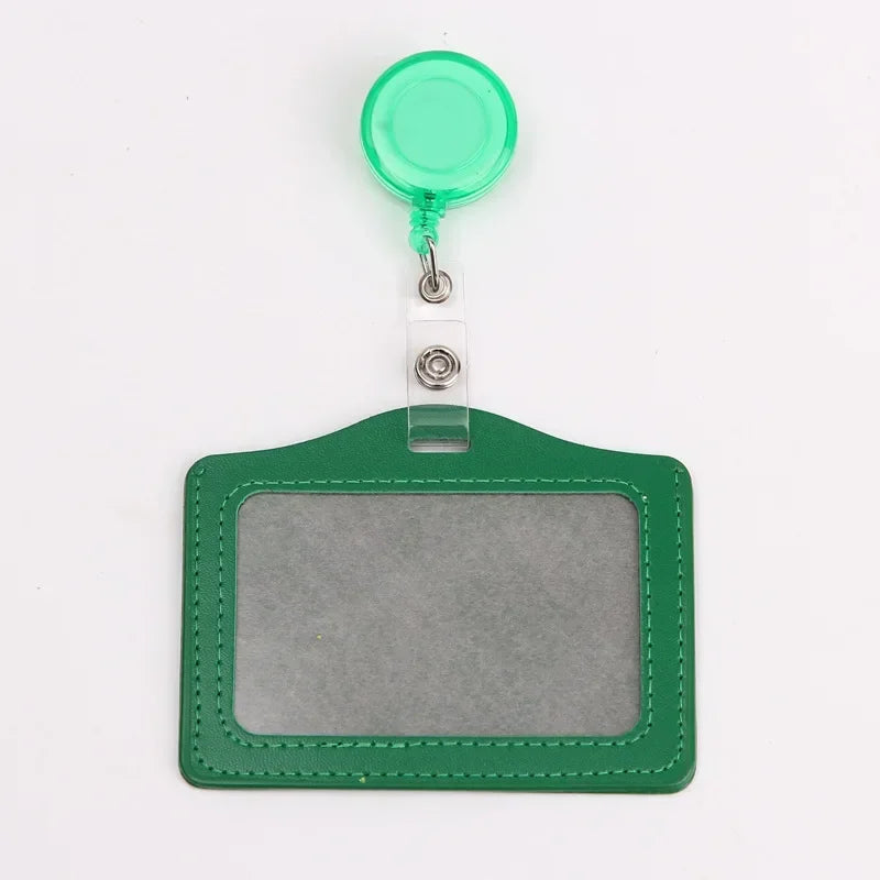 A green PU leather retractable ID card holder with a clear plastic badge case and attached keyring.
