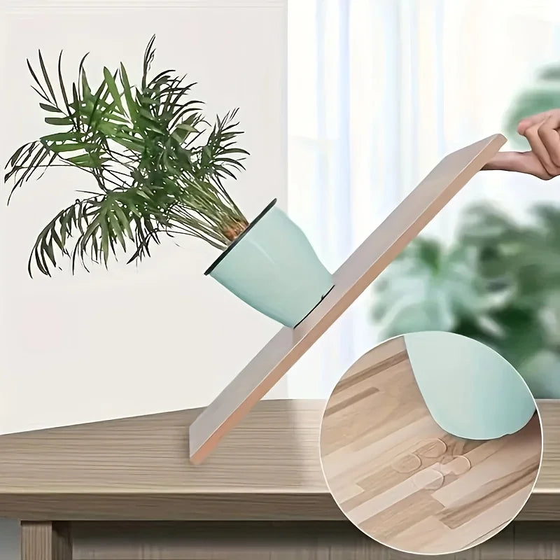 A wooden mounting tape is shown holding a potted green plant on a table.