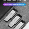 Three Lexar M400 USB 3.2 Gen 1 flash drives are displayed on a dark surface.