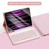 A pink iPad case with a Bluetooth keyboard is shown open, displaying a colorful graphic on the screen.