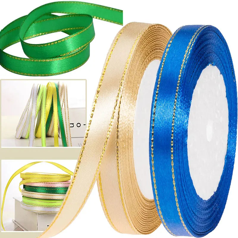 Rolls of gold, green, and blue satin ribbon for crafting and decoration