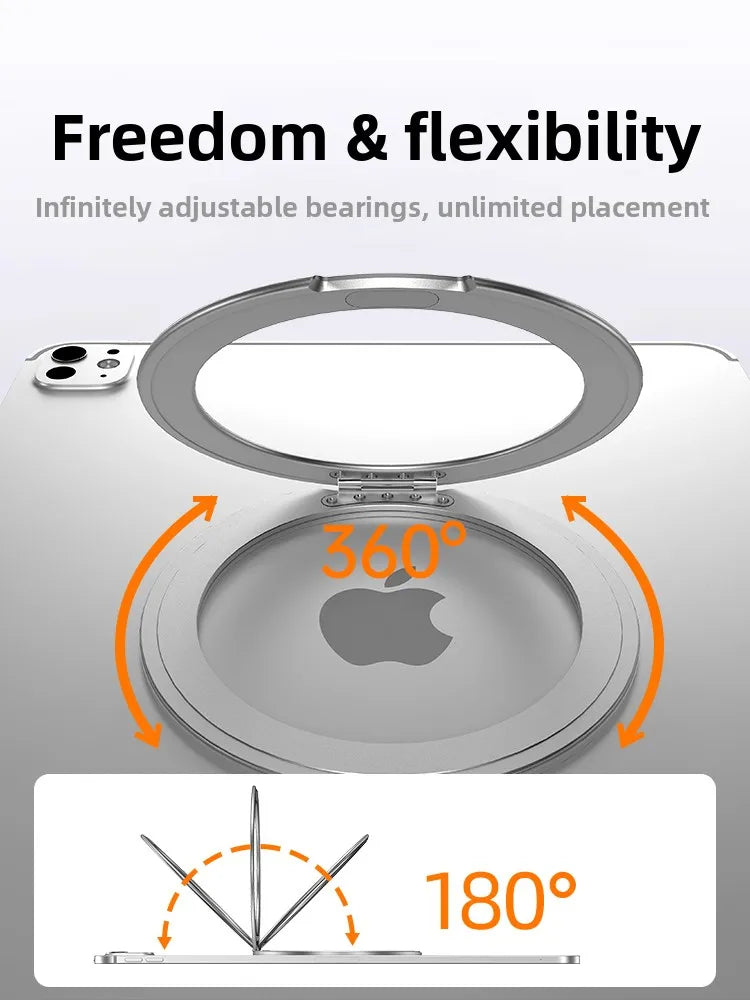 A silver magnetic tablet holder demonstrating 360-degree adjustable bearings and an 180-degree placement angle.