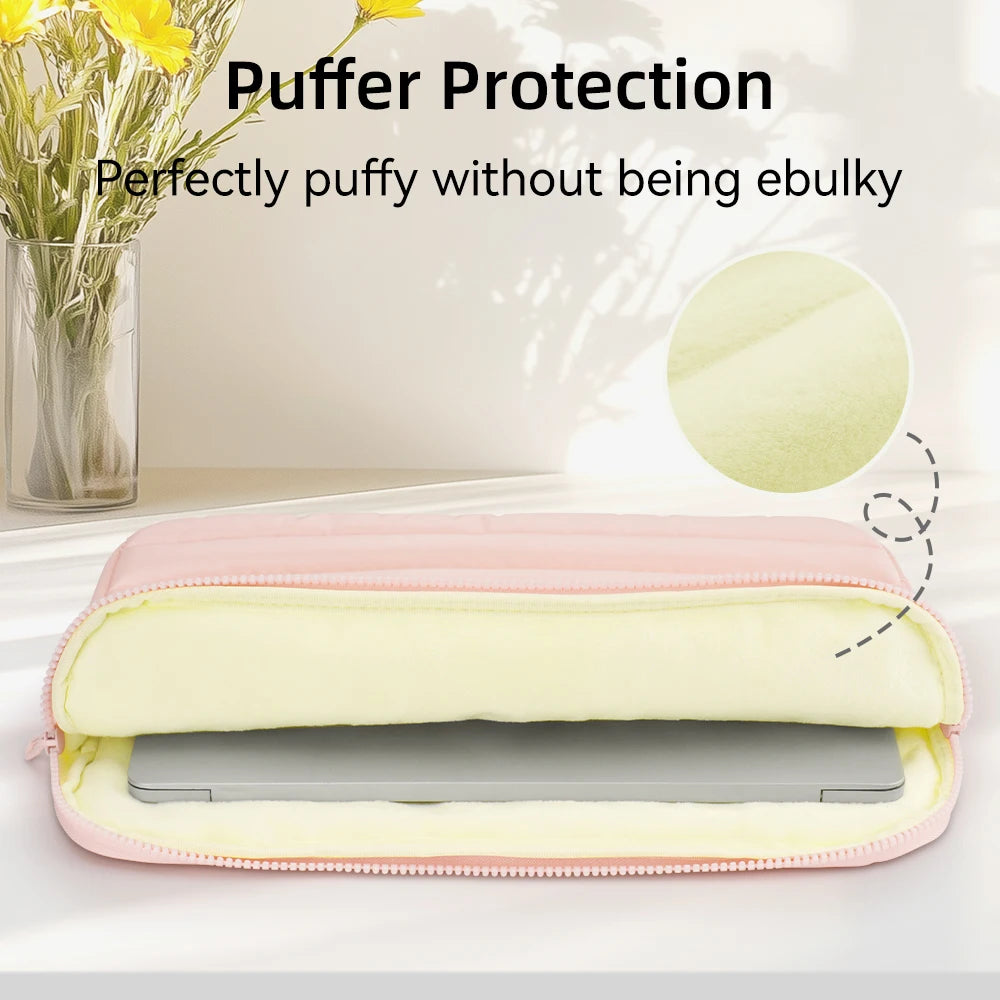 Pink padded laptop sleeve protecting a silver electronic device.