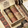A box containing a set of vintage floral washi tape rolls with decorative patterns and packaging.